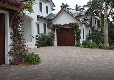 A paved driveway of a luxury Naples home from the TriCircle porfolio for Inspiration
