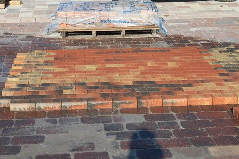 Pavers laid out in a Pallet Blend of two different paver colors