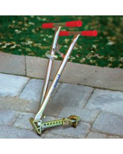 A pave extractor lying flat on a paved floor